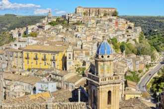Elevated view of the church of Santa Maria dell'Itria and Ragusa Ibla in the distance, Ragusa Ibla,
