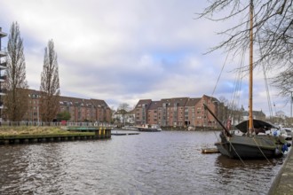 Boats in harbour, Mühlenhunte river, Oldenburg, Lower Saxony, Germany
