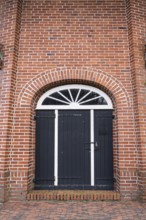Entrance to a historic windmill, Bad Zwischenahn, Lower Saxony, Germany