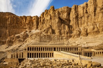 Mortuary temple of Pharaoh Hatshepsut - Deir el-Bahari, behind the rock face lies the Valley of the