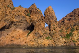 Rock formations and deep blue water in Scandola Nature Reserve, Corsica