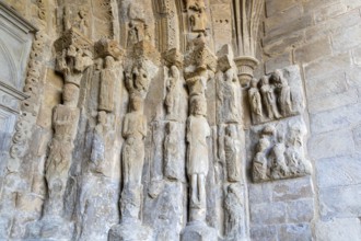 Stone carved figures doorway Iglesia de San Esteban, Romanesque church, Sos del Rey Católico, Cinco