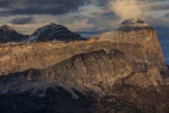 Steep mountains, mountain range, evening light, cloudy, autumn, Pordoi Pass, view of Tofana Group,