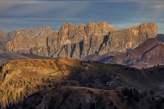 Steep mountains, mountain range, evening light, cloudy, autumn, Pordoi Pass, view of Croda da Lago,