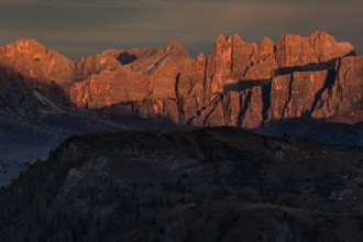 Steep mountains, mountain range, sunset, cloudy, autumn, Pordoi Pass, view of Croda da Lago,