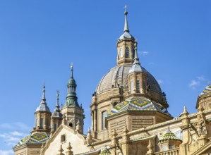 Towers and domes on roof of Basilica of Our Lady of the Pillar cathedral church, Zaragoza, Aragon,