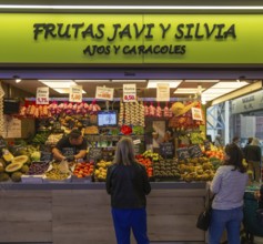 Market stall shop store selling fruit and vegetables inside Mercado Central de Zaragoza, Zaragoza,