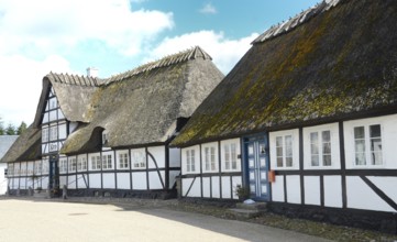 Danish inn, restaurant, in typical half-timbered house with thatched roof on Funen, Fyn island,