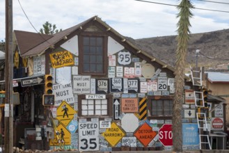 Goldfield, Nevada - An old house covered by road signs