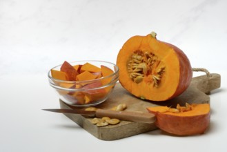 Hokkaido pumpkin, sliced with a knife
