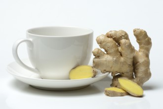 Ginger root with cup, ginger tea