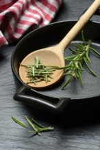 Rosemary, rosemary leaves and rosemary sprig with cooking pot