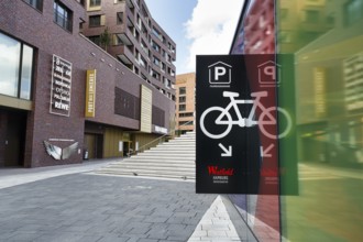 Sign with inscription, pictogram, bicycle garage, bicycle parking garage at the museum, Port des
