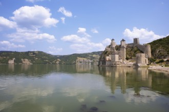 Golubac Fortress or Kolumbatz or Pigeon Town or Pigeon Castle on the Danube, in the background the