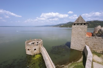 Golubac Fortress or Kolumbatz or Pigeon Town or Pigeon Castle on the Danube, in the background the