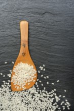 Rice grains with cooking spoon, rice