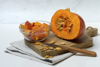 Hokkaido pumpkin, sliced with a knife