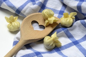 Saccottini, type of Italian pasta and cooking spoon with heart, pasta from Italy