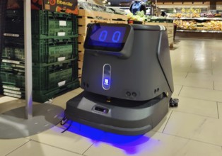 Cleaning robot in supermarket, Witten, North Rhine-Westphalia, Germany