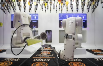 Las Vegas, Nevada - Robotic bartenders mix and serve drinks at the 'Tipsy Robot' in the Venetian