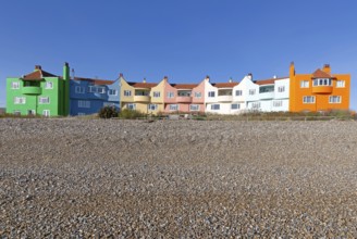 Colourful 1930s seaside houses called The Headlands on the beach at Thorpeness, Suffolk, England,