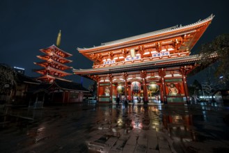 Illuminated five-story pagoda and main hall of Asakusa Shrine or Senso-ji Temple, at night,