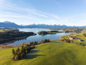 Extensive landscape with a central lake and mountains in the background, Illasbergsee, Forggensee,