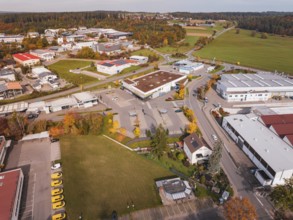 An industrial area in autumn with wide roads and autumn trees in a rural area, Althengstett, Calw