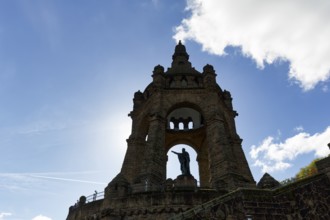 Kaiser Wilhelm Memorial, national monument with dome, landmark, sunny autumn weather, backlight,