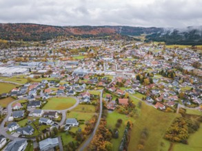 Spacious village surrounded by autumn landscape, photographed from the air, Wehingen, Tuttlingen