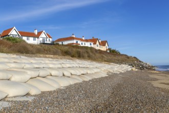 Clifftop houses at risk from coastal erosion, Thorpeness, Suffolk, North Sea coast, England, UK