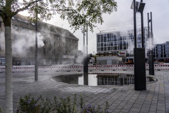 Digital water feature, Blue Cloud water installation on Husemanplatz in downtown Bochum, water mist