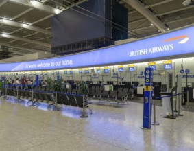 British Airways check in bag drop area, Terminal 5 London Heathrow airport, London, England, UK