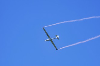 An SZD-59-1 ACRO glider, registration D-1138, during a demonstration as part of an air show at the