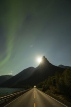 National mountain of Norway - Stetind in the Nordland under auroras and a full moon