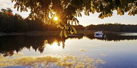 Atmospheric sunset over Lake Grienerick, Rheinsberg, Brandenburg, Germany