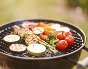 Cooking vegetables on grill outdoors, healthy lifestyle with healthy food, close up of grill with