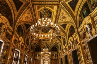 Sumptuous room and chandelier in the Vienna State Opera, Vienna, Austria