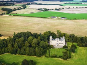 Wedderburn Castle and Barns over fields from a drone, Duns, Berwickshire, Scotland, UK
