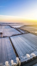 Bird Eye Perspective of Frost Covered Farmland. Seasonal Agricultural Scenery, winter and autumn