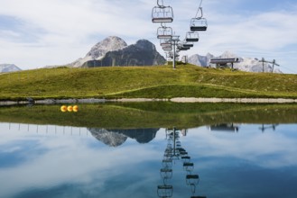 Mountain landscape with reservoir and chairlift, Saloberkopf, Warth, Bregenzerwald, Vorarlberg,