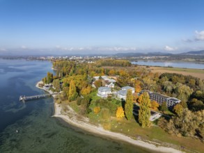 Aerial view of the Mettnau peninsula, surrounded by autumn vegetation, in western Lake Constance