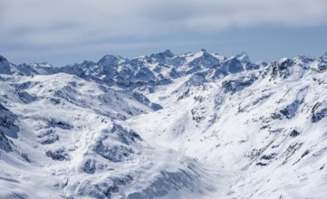 View of mountain panorama with mountain peaks of the Bernina Group, mountain landscape in winter,