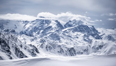 View of mountain panorama with mountain peaks of the Bernina Group, mountain scenery in winter,