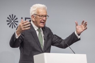 Winfried Kretschmann (Greens), Minister-President of Baden-Württemberg. portrait at the lectern