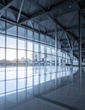 Modern architectural framework with glass and steel structure, glass facade with a greed of steel