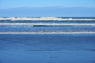 Gentle waves meet the beach, sky and sea in harmony, Spencer Park Beach, Spencerville,