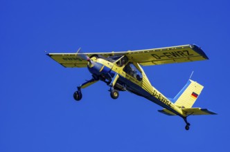 A PZL-104 Wilga-35A sport aircraft from Fliegerklub Kamenz with registration D-EWRZ during a flight