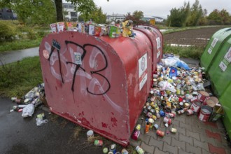 Overfilled can containers, Eckental, Middle Franconia, Bavaria, Germany