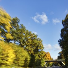 Car ride over winding country road, autumn leaves, sunny autumn weather, motion blur, Barntrup,